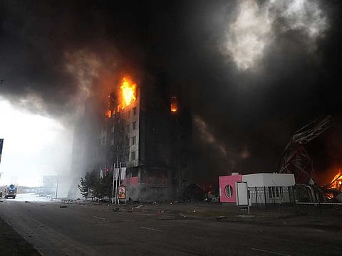 A building burns after shelling in Kyiv, Ukraine, Thursday, March 3, 2022.