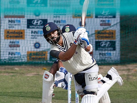 Virat Kohli practises at the nets ahead of the first Test match against Sri Lanka at the Punjab Cricket Association stadium in Mohali on March 1, 2022.