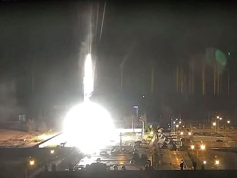 Surveillance camera footage shows Zaporizhzhia nuclear power plant during shelling in Enerhodar, Zaporizhia Oblast, Ukraine, on March 4, 2022, in this screengrab from a video obtained from social media.