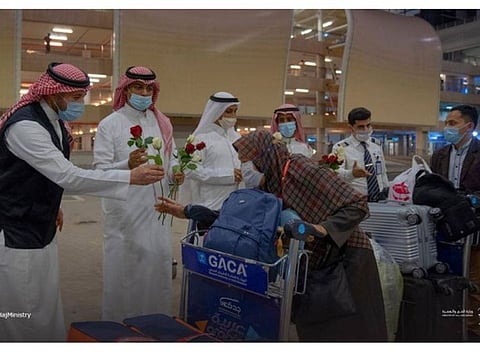 Umrah pilgrims being welcomed at the King Abdulaziz airport in Jeddah.