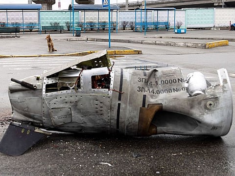 The remains of a missile lie on a street in Vydubychi district of Kyiv, Ukraine.