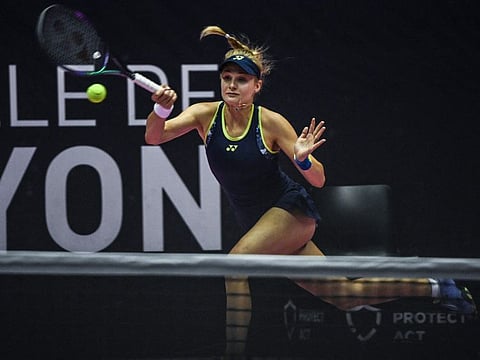Ukraine's Dayana Yastremska returns the ball against Romanian Sorana Cirstea during the WTA Sens Open semi-final tennis match in Lyon.