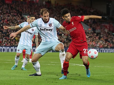 Liverpool's Luis Diaz in action with West Ham United's Craig Dawson.