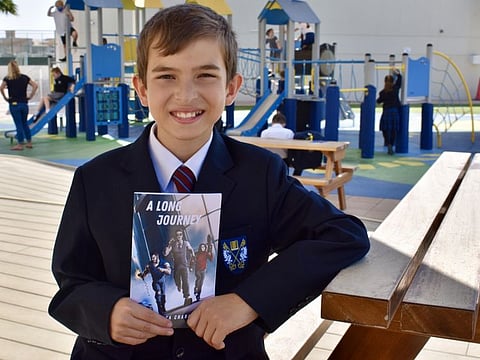 Luca Charawani, 11, with his new release.