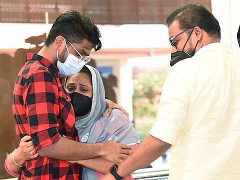 An Indian student meets his parents on arrival at the airport in Kochi after being evacuated from Ukraine.