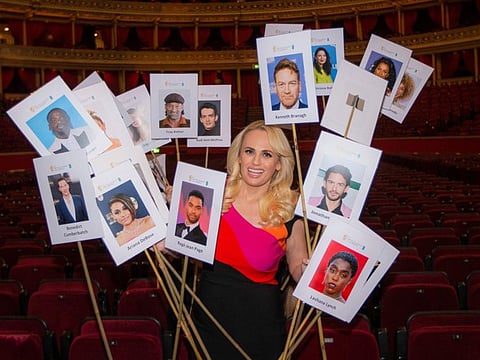 Rebel Wilson poses for photographers amongst the seating plan ahead of the British Academy Film Awards on that take place on Sunday, March 13, at the Royal Albert Hall in central London.