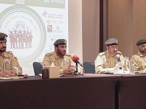 Major General Abdullah Ali Al Ghaithi (mcentre left), with Colonel Obaid Bin Yarouf (centre right) and two other Dubai Police officers during the announcement for World Police Summit 2022.