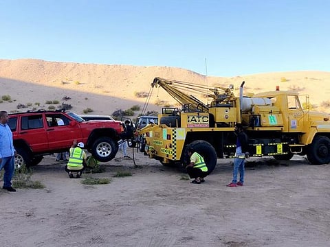 Car being recovered from the desert on the 40th edition of the Gulf News Overnighter Fun Drive - Tilal Swaihan Experience