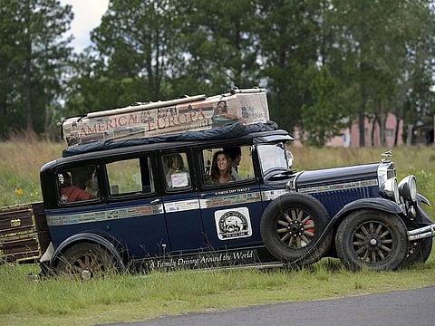 Argentinian Herman Zapp drives his car with his family onboard