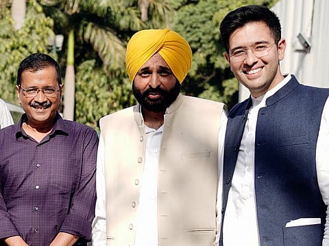 AAP Punjab affairs co-in-charge Raghav Chadha with Chief Ministerial candidate for Punjab Bhagwant Mann and party chief Arvind Kejriwal. Chadha was AAP’s election coordinator for Punjab.