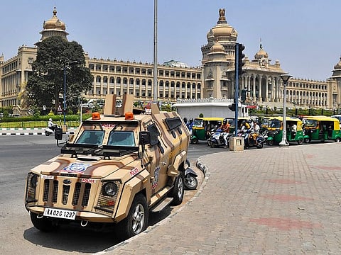 An armoured police vehicle parked outside the Karnataka Vidhana Soudha, Karnataka's legislative building, in Bangalore on March 15, 2022, after the court upheld a local ban on the hijab in classrooms, weeks after the edict stoked violent protests.
