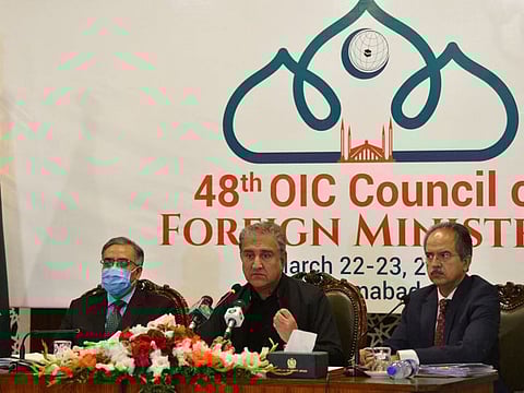 Pakistani Foreign Minister Shah Mehmood Qureshi (centre) briefs to media representatives for the upcoming 48th session of Organisation of Islamic Cooperation (OIC) Council of Foreign Ministers, in Islamabad on March 15, 2022.