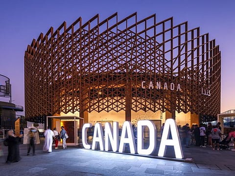 Visitors outside the Canada Pavilion at Expo 2020 Dubai.