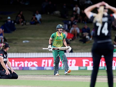 South Africa’s Marizanne Kapp (centre) celebrates their last-gasp win as New Zealand players react during the 2022 Women's Cricket World Cup match at Seddon Park in Hamilton on Thursday.