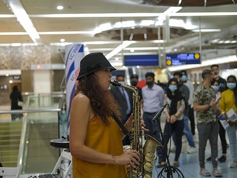 Monique, South African, performs playing Saxophone, during the 2nd Dubai Metro Music Festival at Union metro station on the second day of Dubai Metro Music festival 2022. 17th March 2022 Photo: Ahmed Ramzan/ Gulf News
