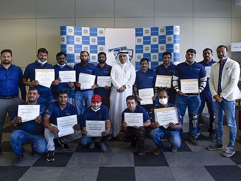 Gulf News CEO, Editor-in-Chief and Executive Director of Publishing, Abdul Hamid Ahmad and Potru Raju, Director-Circulation Sales &Distribution, at the ceremony to ward the 35 delivery boys for their services.