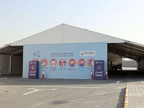 SCM opens largest drive-through COVID-19 testing tent in Sharjah.
