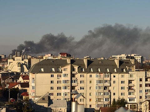 Smoke rises after an explosion in the western Ukrainian city of Lviv on March 18, 2022.