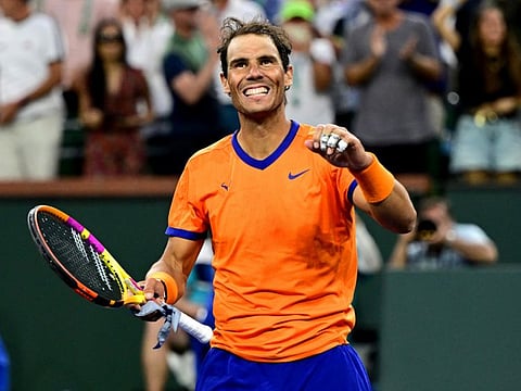 Rafael Nadal celebrates after defeating Carlos Alcaraz in their semifinal match in the BNP Paribas Open at the Indian Wells Tennis Garden.