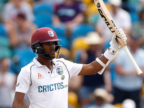 West Indies captain Kraigg Brathwaite celebrates after scoring 150 runs in the Second Test against England at the Kensington Oval in Bridgetown, Barbados, on March 19, 2022.