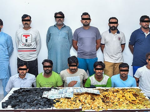 The suspects with the fake gold pieces