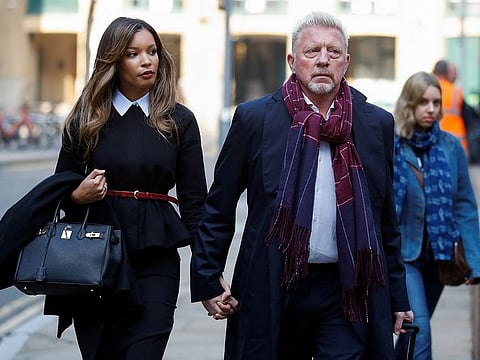 Boris Becker arrives with his partner Lilian de Carvalho Monteiro at Southwark Crown Court for a hearing on his bankruptcy offences trial in London on Monday.
