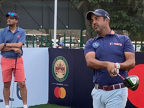 Shiv Kapur in the DGC Open Pro-Am watched by actor Kunal Nayyar