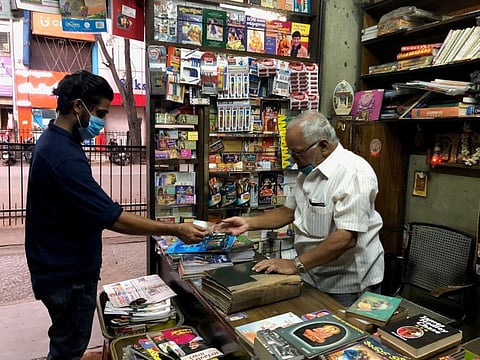 Co-founder GRJ Gupta interacting with a young reader.