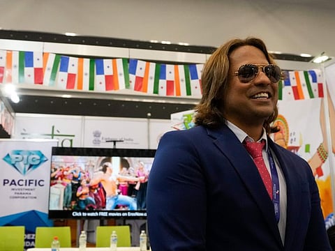 Actor, producer and businessman Prabhakar Sharan talk with the media before signing an agreement to produce Bollywood style movies in Panama, during Expocomer 2022 international trade show in Panama City, Wednesday, March 23, 2022.