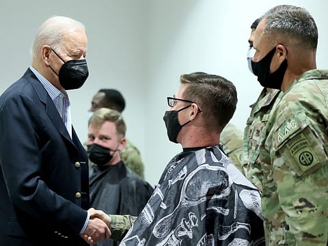 U.S. President Joe Biden meets US Army soldiers assigned to the 82nd Airborne Division at the G2 Arena in Jasionka, near Rzeszow, Poland, March 25, 2022.