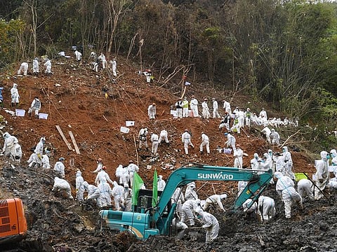 Rescuers conduct search and rescue work at the core site of the plane crash in Tengxian County, southern China's Guangxi Zhuang Autonomous Region, on March 25, 2022.