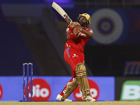 Punjab Kings Bhanuka Rajapaksa plays a shot during the Indian Premier League 2022 match against the Royal Challengers Bangalore, at the DY Patil Stadium, in Mumbai.