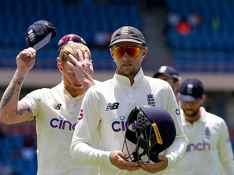 England's captain Joe Root leads his team off the field after losing against West Indies