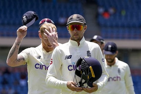 Time to go... England's captain Joe Root leads his team off the field after losing against West Indies by ten wickets on day four of their third Test cricket match at the National Cricket Stadium in St. George, Grenada.