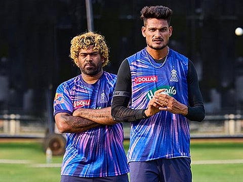 Sri Lanka fast bowling legend Lasith Malinga (left) is having a positive effect on Rajasthan Royals as their bowling coach, says captain Sanju Samson.