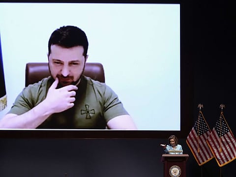 US Speaker of the House Nancy Pelosi speaks as Ukrainian President Volodymyr Zelensky delivers a virtual address to Congress at the US Capitol on March 16, 2022 in Washington, DC. Zelensky has uploaded a steady stream of videos to his social media accounts, inspiring Ukrainians to fight back.