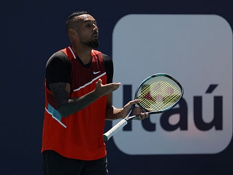 Nick Kyrgios argues with chair umpire Carlos Bernardes (not pictured) after being assessed a point penalty during the match against Jannik Sinne in the fourth round of the men's singles match in the Miami Open at Hard Rock Stadium.
