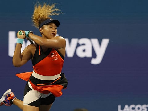 Naomi Osaka hits a backhand against Danielle Collins in the women's singles quarterfinal in the Miami Open at Hard Rock Stadium.