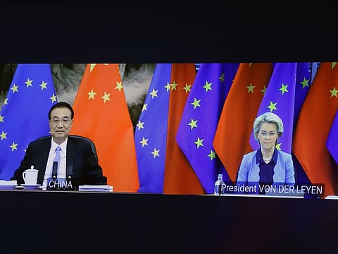 Li Keqiang, China's premier, left, and Ursula von der Leyen, president of the European Commission, on screen via video conference during the EU-China summit at the EU Council headquarters in Brussels, Belgium, on Friday, April 1, 2022.