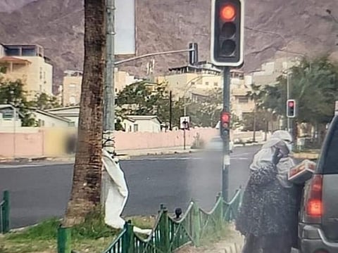 The 26-year-old Jordanian dressed up as an old woman caught on camera.
