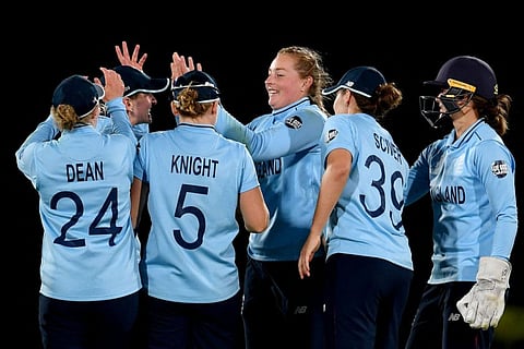 England's Sophie Ecclestone (centre) celebrates with captain Heather Knight and the rest of the team after beating South Africa in the 2022 Women's Cricket World Cup semi-final at Haley Oval in Christchurch. England face Australia in the final tomorrow.