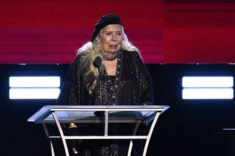 Canadian singer-songwriter Joni Mitchell speaks on stage after accepting the 2022 MusiCares Person of the Year award on April 1, 2022.