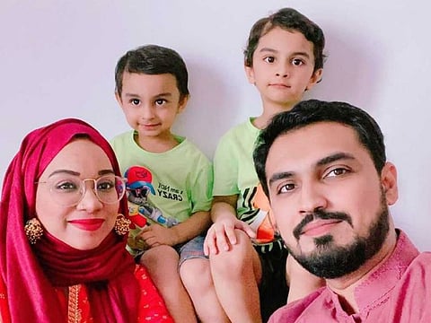 Beenish Umair Kapadia with her husband and two of her sons.