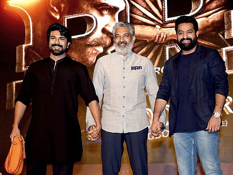 Tollywood actors NT Rama Rao Jr and Ram Charan with director SS Rajamouli.