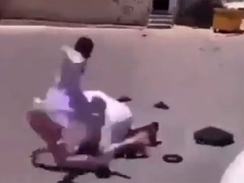 Student beating up his teacher.