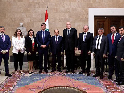 Lebanese President Michel Aoun, Prime Minister Najib Mikati and officials meet with a delegation from the International Monetary Fund at the presidential palace in Baabda, Lebanon, on April 7, 2022.