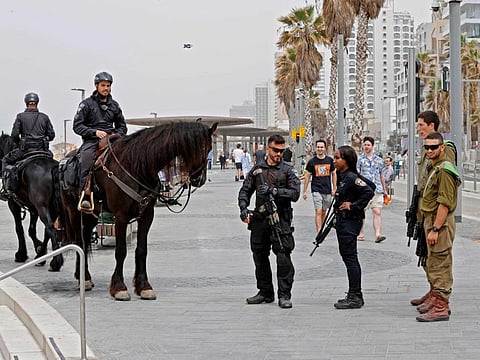 Israelis mounted police patrol the centre of Israel's Mediterranean coastal city of Tel Aviv on April 8, 2022 a day after a Palestinian gunman killed two Israeli men and wounded several others in Tel Aviv.
