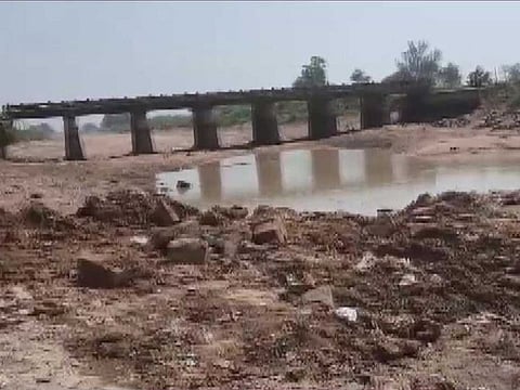 A picture of the 60-foot bridge in Bihar before it was demolished.