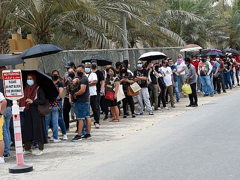 Filipino expats queue up at the Philippine Consulate General (PCG) in Dubai to cast their votes on Sunday.