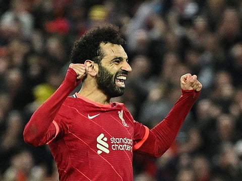 Liverpool's Mohamed Salah celebrates after scoring his second and the team's fourth.